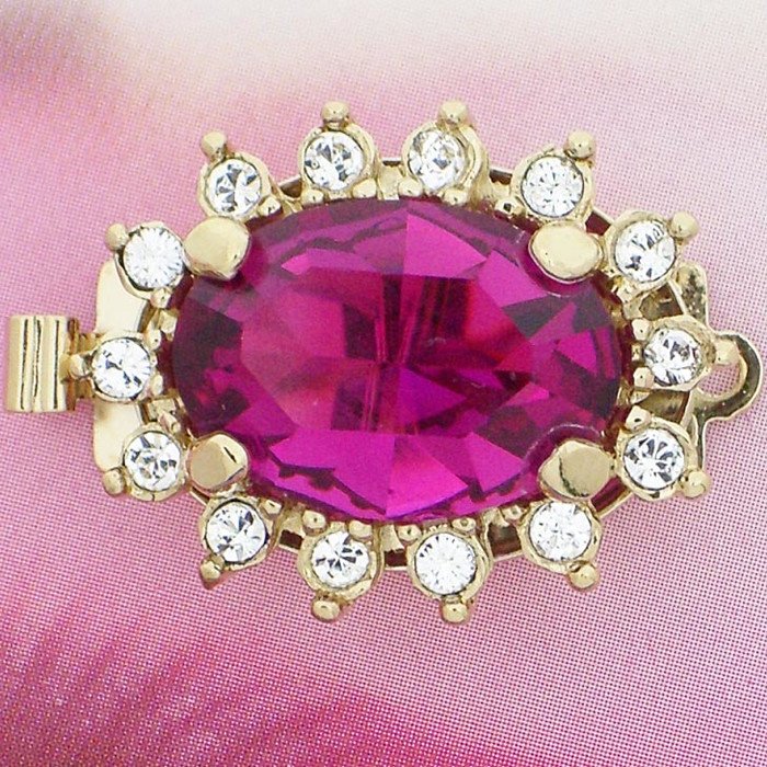 Clasp with spring tongue mechanism; Colour of the stone in the center: fuchsia