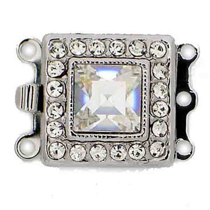 Art Deco design three row multi-breasted box closure with crystals. In the center 1 large crystal surrounded by 20 small ones