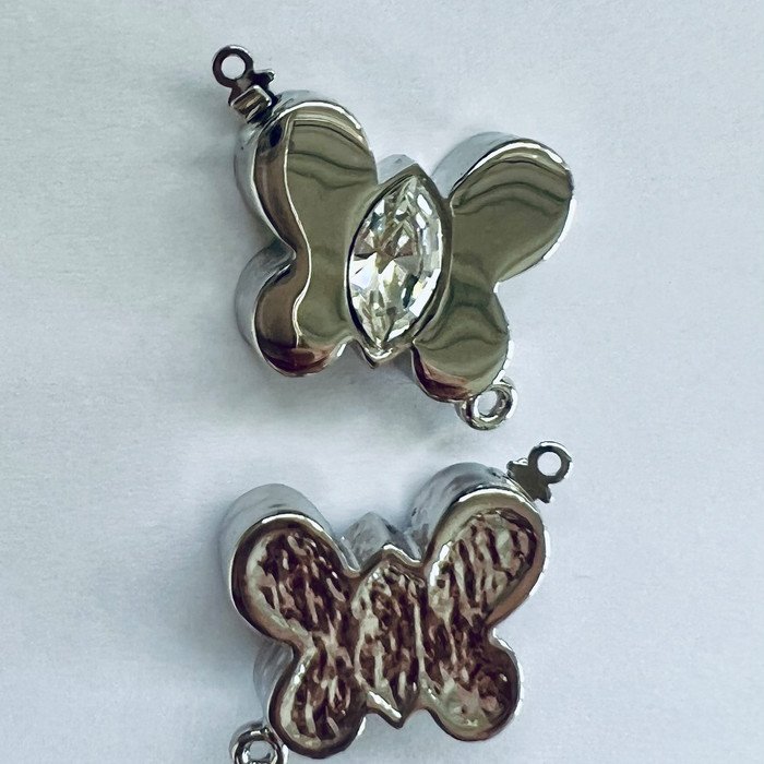 Clasp with spring tongue mechanism